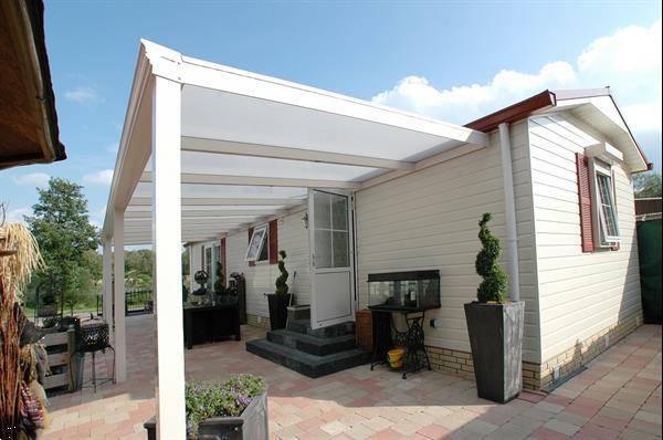 Grote foto profiline xxl veranda 1100x300 cm polycarbonaat dak tuin en terras tegels en terrasdelen