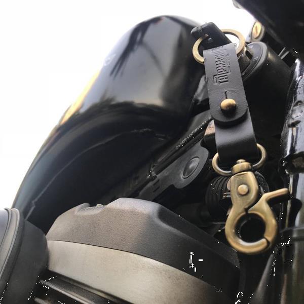 Grote foto trip machine key fob zwart antiek goud motoren kleding