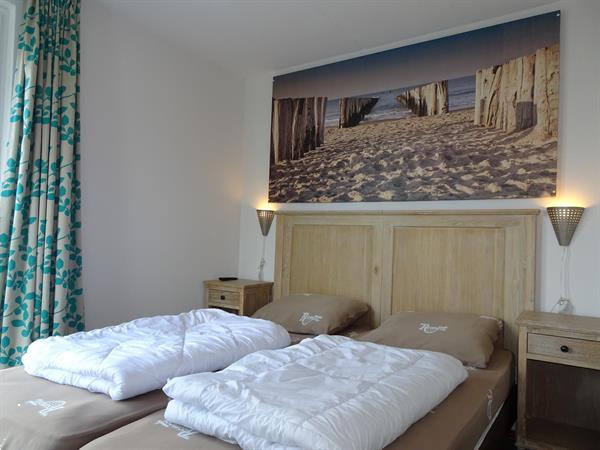 Grote foto lekker uitwaaien aan de kust en vooral genieten van deze lux huizen en kamers recreatiewoningen