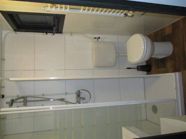 Grote foto camping trimunt tegen bos gelegen caravans en kamperen campings