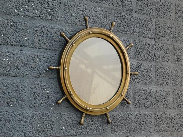 Grote foto een ronde spiegel als een stuurwiel scheepsstuur huis en inrichting spiegels