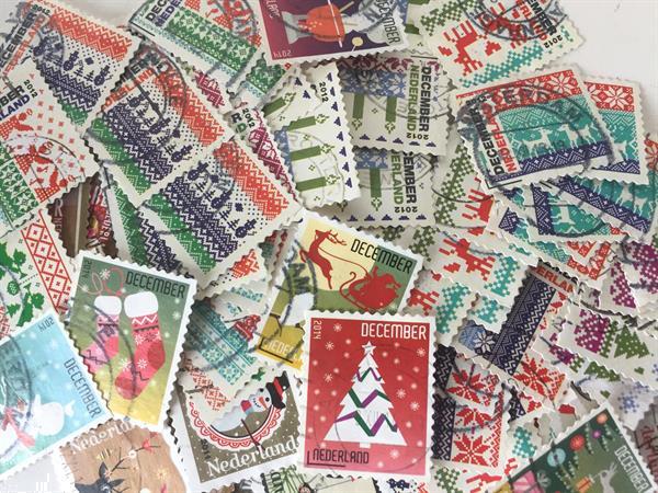 Grote foto decemberzegels nederland ca 100 stuks postzegels en munten nederland