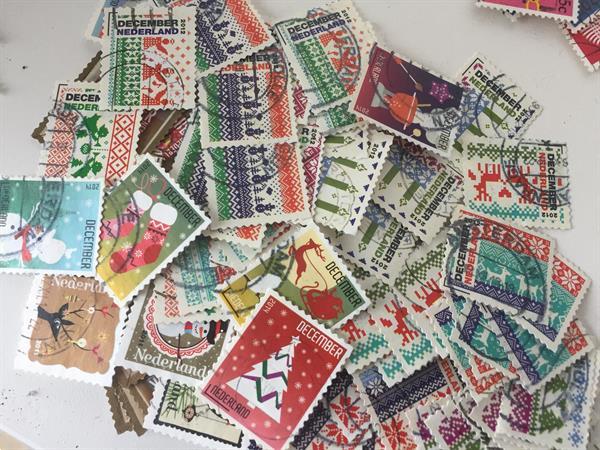Grote foto decemberzegels nederland ca 100 stuks postzegels en munten nederland