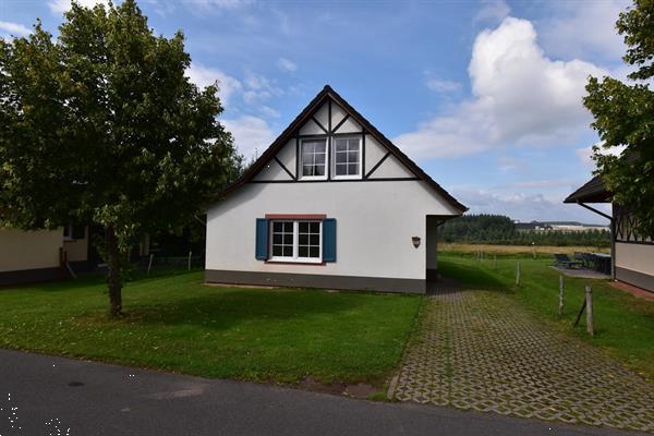 Grote foto vakantiehuis te koop aan een golfbaan. huizen en kamers vrijstaand