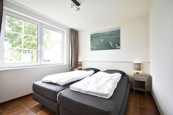 Grote foto vakantiehuis te koop aan een golfbaan. huizen en kamers vrijstaand