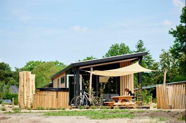 Grote foto zand lodge voor 4 personen met spa op de veluwe in voorthuiz vakantie nederland midden