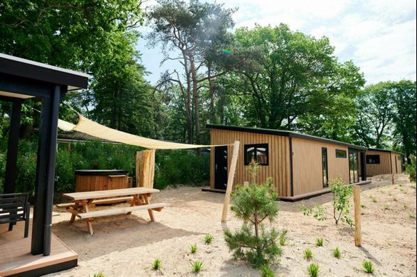 Grote foto zand lodge voor 4 personen met spa op de veluwe in voorthuiz vakantie nederland midden