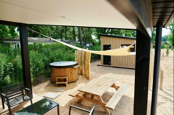 Grote foto zand lodge voor 4 personen met spa op de veluwe in voorthuiz vakantie nederland midden