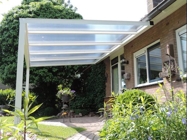 Grote foto greenline veranda 500x400cm polycarbonaat dak tuin en terras tegels en terrasdelen