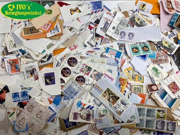 Grote foto grote partij postzegels wereldwijd gestempeld audio tv en foto dvd films