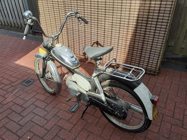 Grote foto old timer puch fietsen en brommers puch