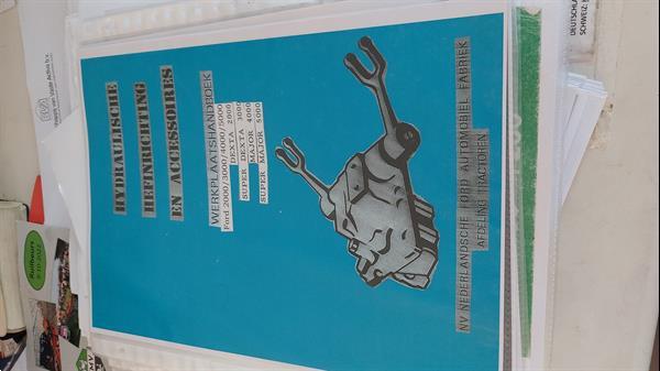 Grote foto oldtimer trachorboeken ter reparatie boeken hobby en vrije tijd