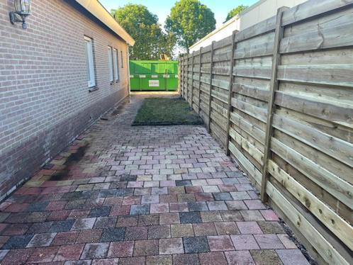 Grote foto doorsteek schutting tuin en terras hekken en schuttingen