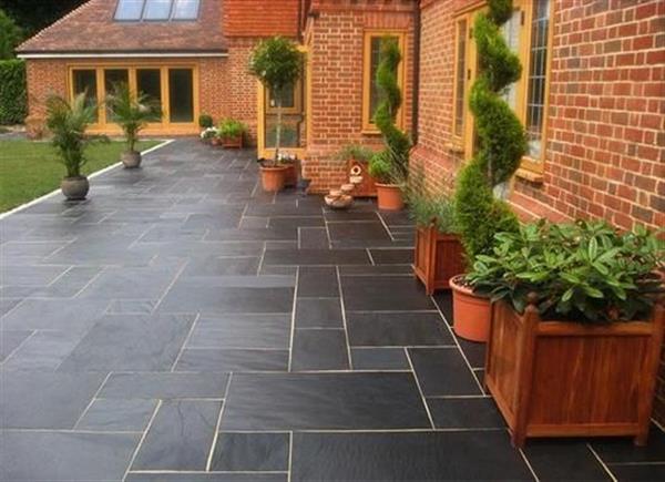 Grote foto mustang leisteen black slate tuintegels groot wildverband tuin en terras tegels en terrasdelen