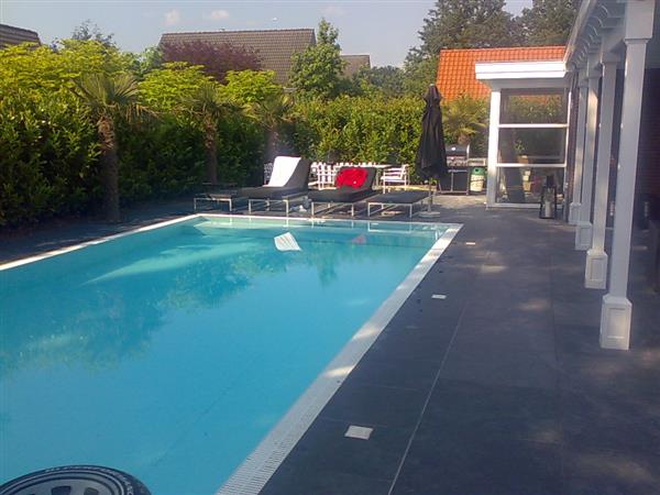 Grote foto mustang leisteen black slate tuintegels groot wildverband tuin en terras tegels en terrasdelen