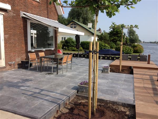 Grote foto landelijke tuintegels castle stone beige wildverband tuin en terras tegels en terrasdelen