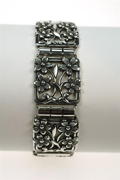 Grote foto zilveren armband met bloemmotieven. kleding dames sieraden