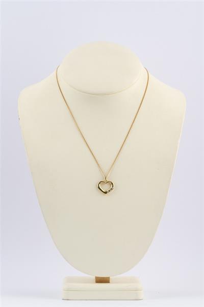 Grote foto gouden hart hanger met briljanten aan gouden collier sieraden tassen en uiterlijk kettingen