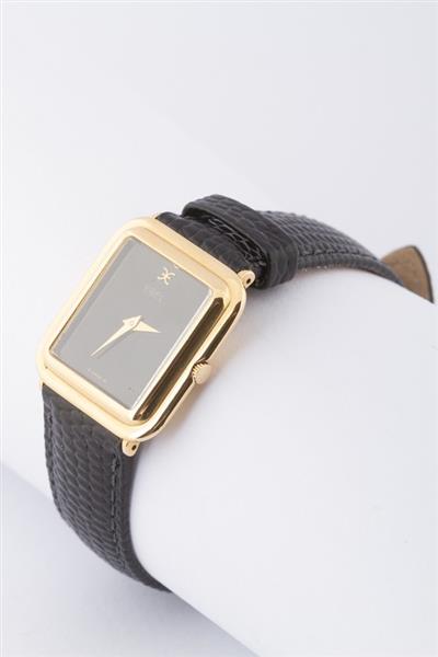 Grote foto gouden ebel horloge aan lederen band kleding dames horloges