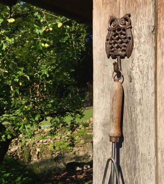 Grote foto garderobe haak op basis van een uil metaal gietijzer tuin en terras tuindecoratie