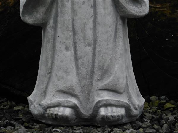 Grote foto groetende monnink vol steen tuin en terras tuindecoratie