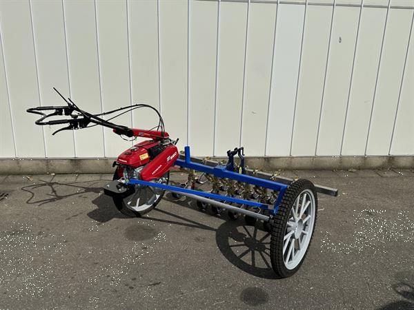 Grote foto honda f560 2 wielige trekker met hak schoffelbalk agrarisch onkruidbestrijding