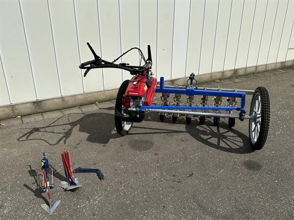 Grote foto honda f560 2 wielige trekker met hak schoffelbalk agrarisch onkruidbestrijding