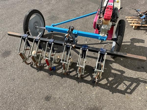 Grote foto honda f560 2 wielige trekker met hak schoffelbalk agrarisch onkruidbestrijding