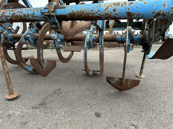 Grote foto imants spitmachine 150 cm met harkrol agrarisch akkerbouw
